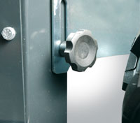 Adjustable discharge door